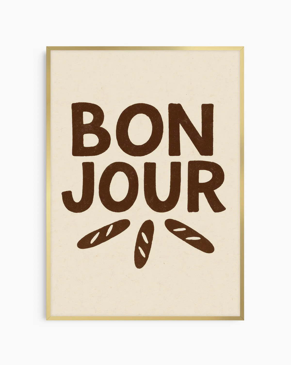 Barntavla med texten "BON JOUR" i mörkbrun text och tre små baguetter på ljus bakgrund, inramad i guld aluminiumram. En söt och lite lyxig väggdetalj.