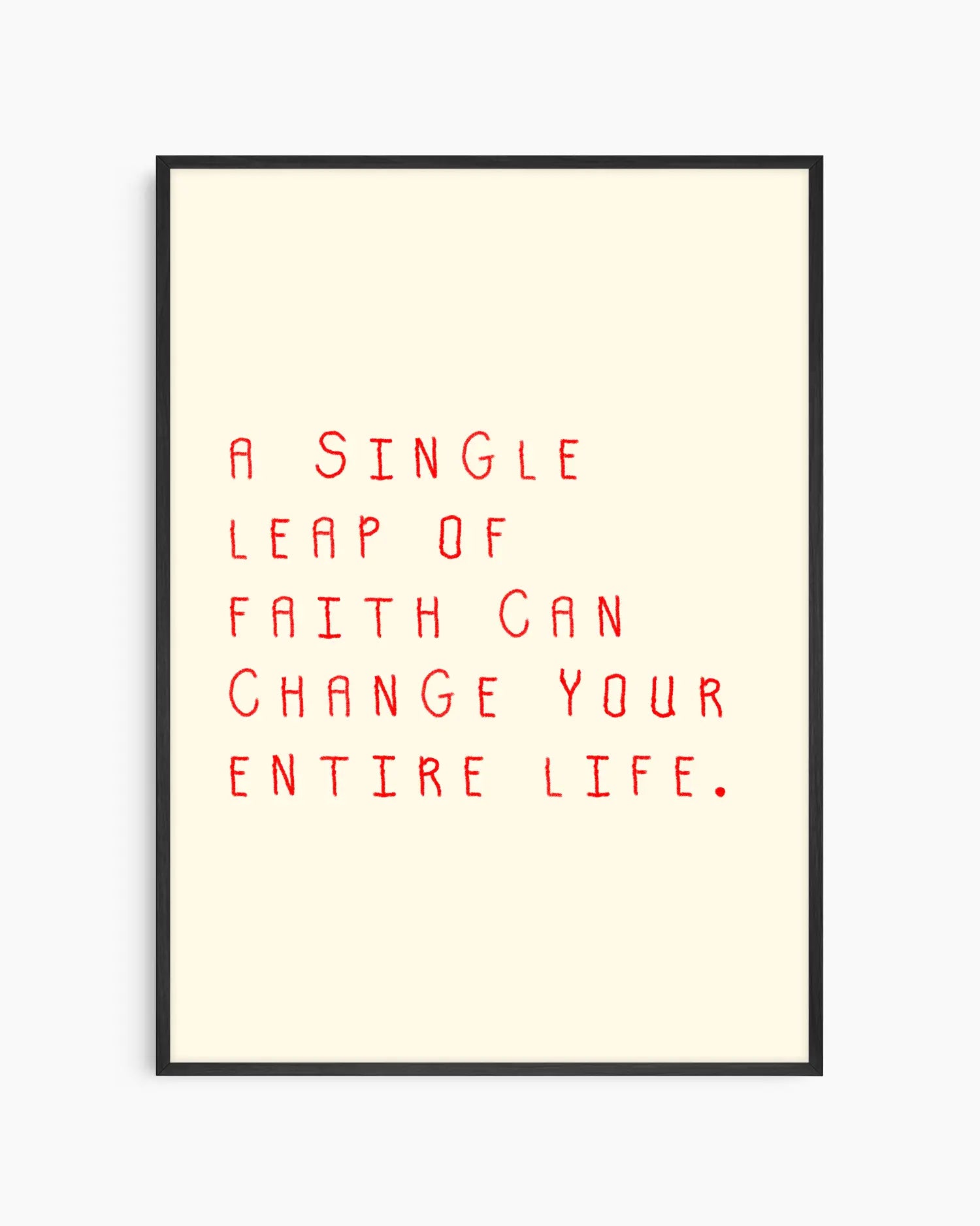 Barntavla med röd text “A single leap of faith can change your entire life.” på ljus bakgrund, inramad i svart träram. En enkel och inspirerande väggdekoration för barnrummet.