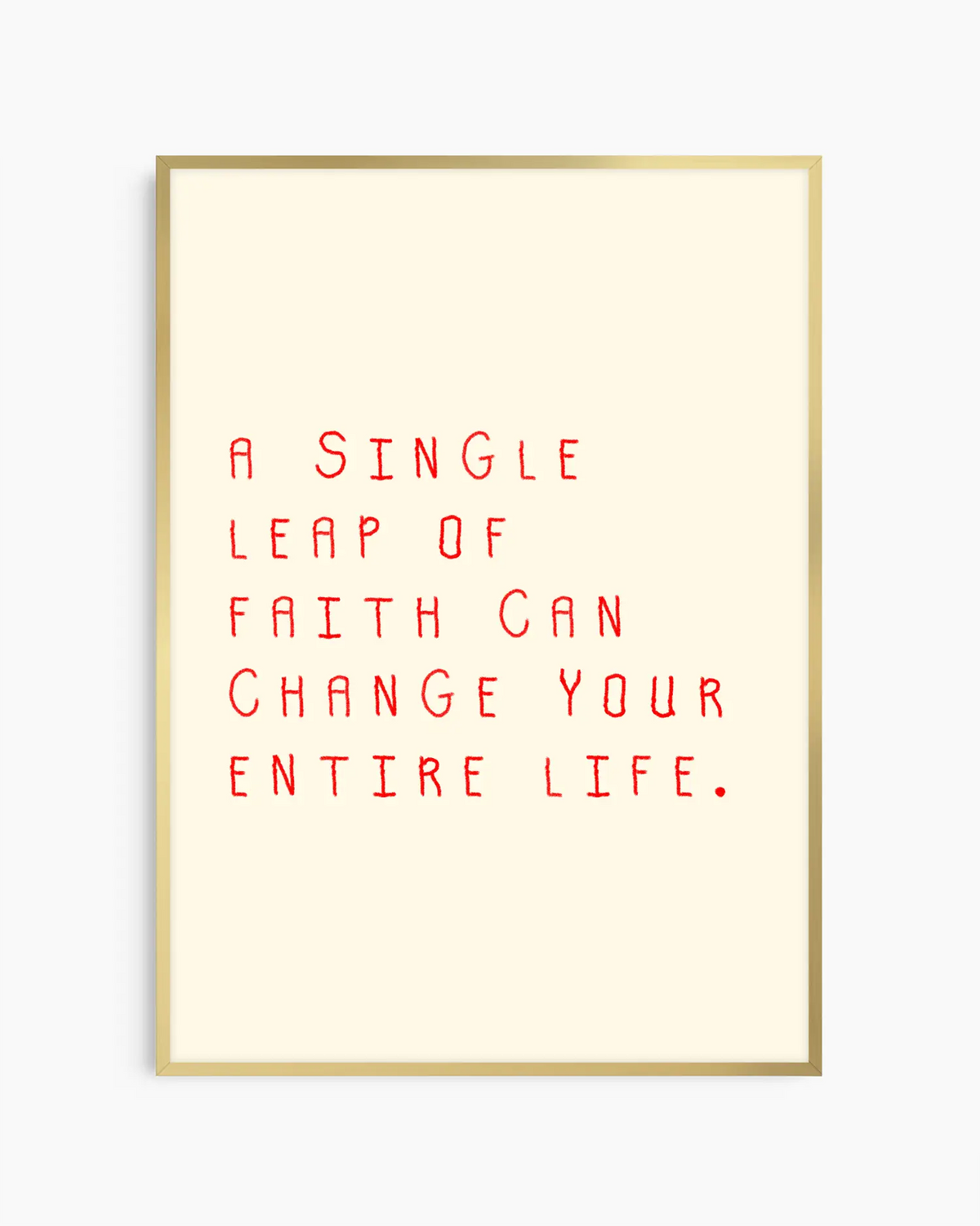 Barntavla med texten “A single leap of faith can change your entire life.” i rött på ljus bakgrund, inramad i guld aluminiumram. En elegant och inspirerande detalj med mjukt uttryck.