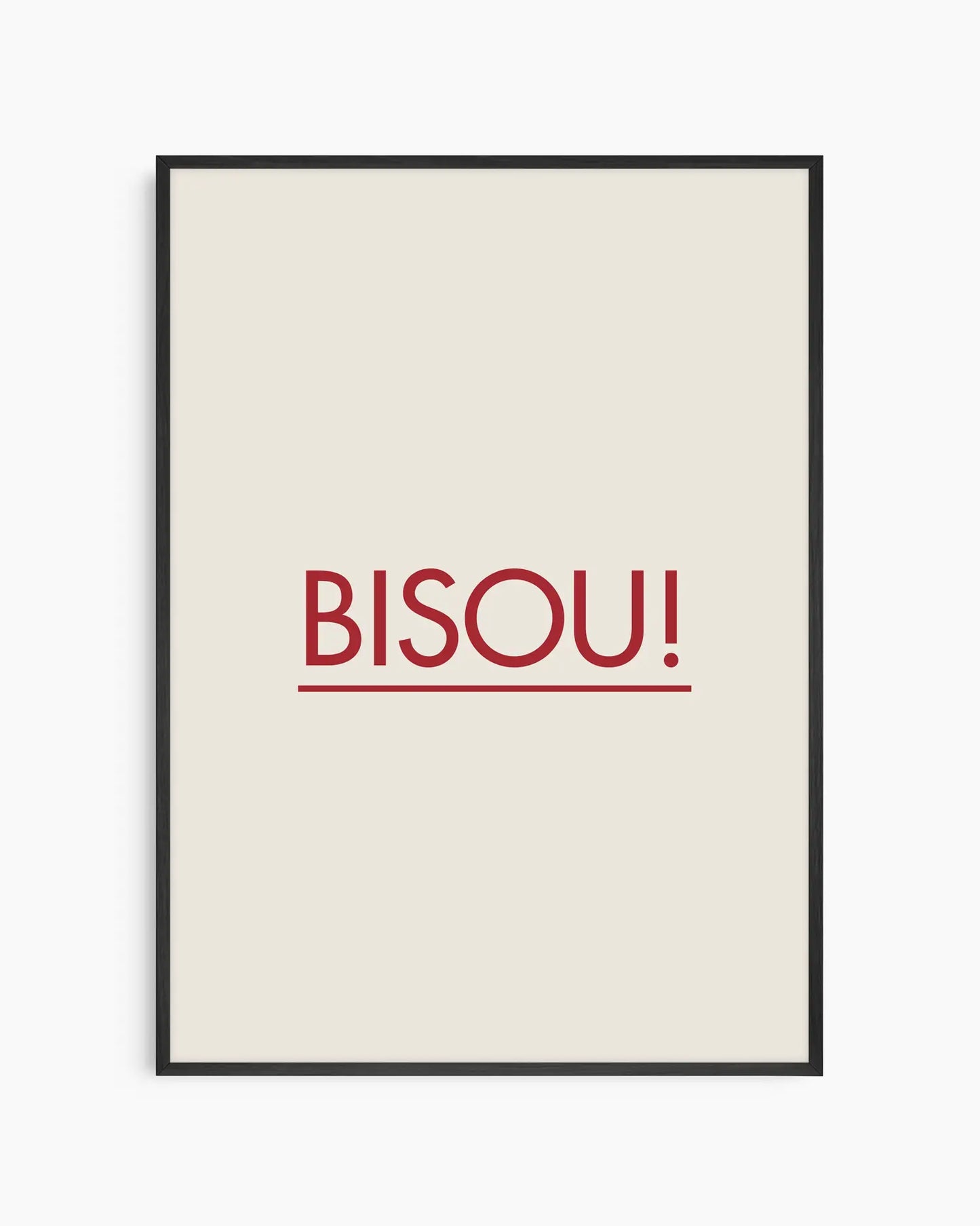 Barntavla med texten "BISOU!" i rött mot beige bakgrund, inramad i svart träram. En enkel och stilren design med fransk charm.