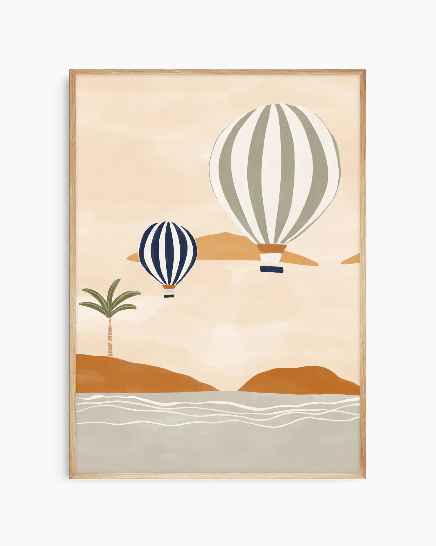 Framed artwork with two hot air balloons over a beach scene on a beige background
