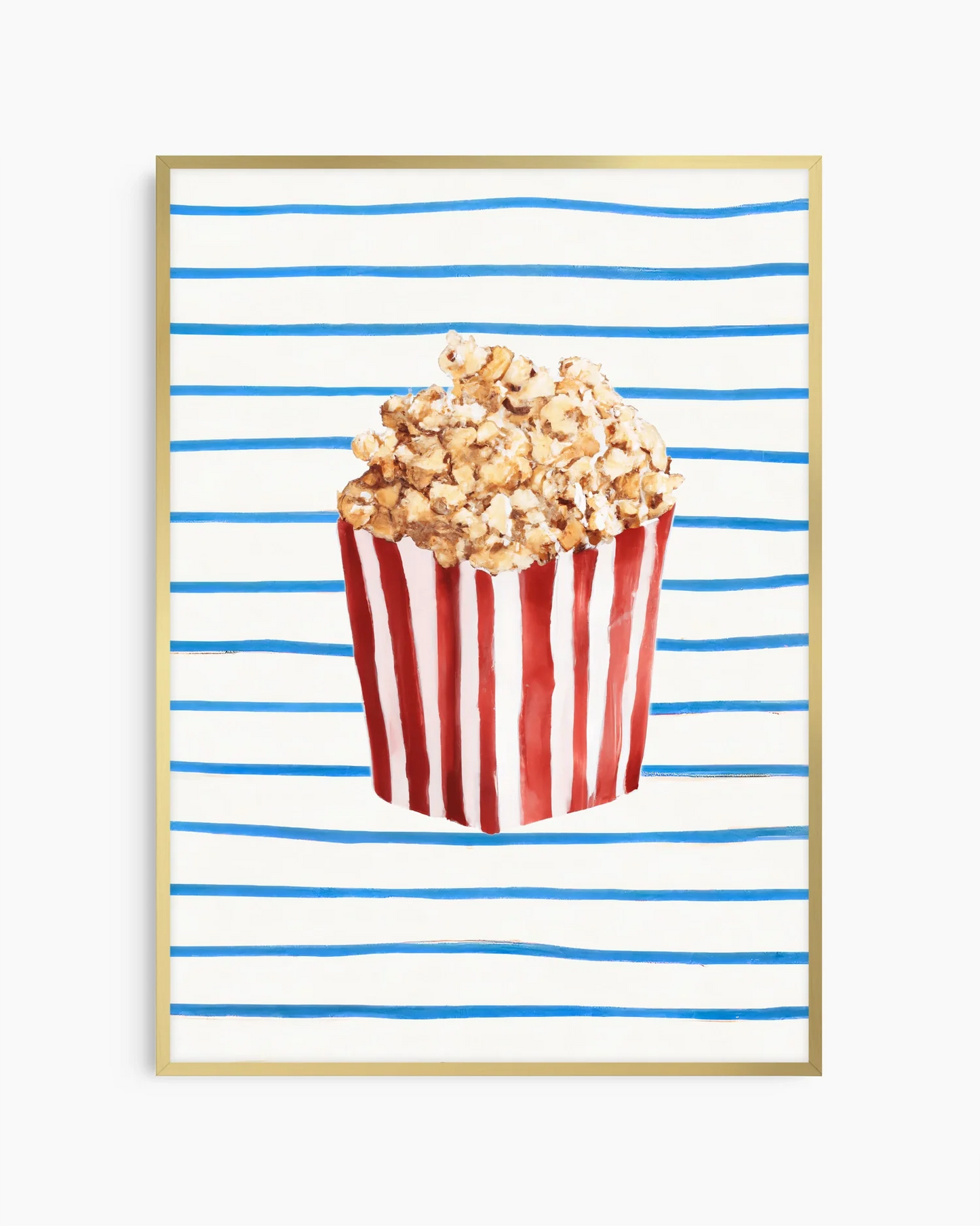 Barntavla med illustration av popcorn i randig rödvit bägare mot blåvitrandig bakgrund, inramad i guld aluminiumram. En färgstark och rolig tavla för barnrummet.