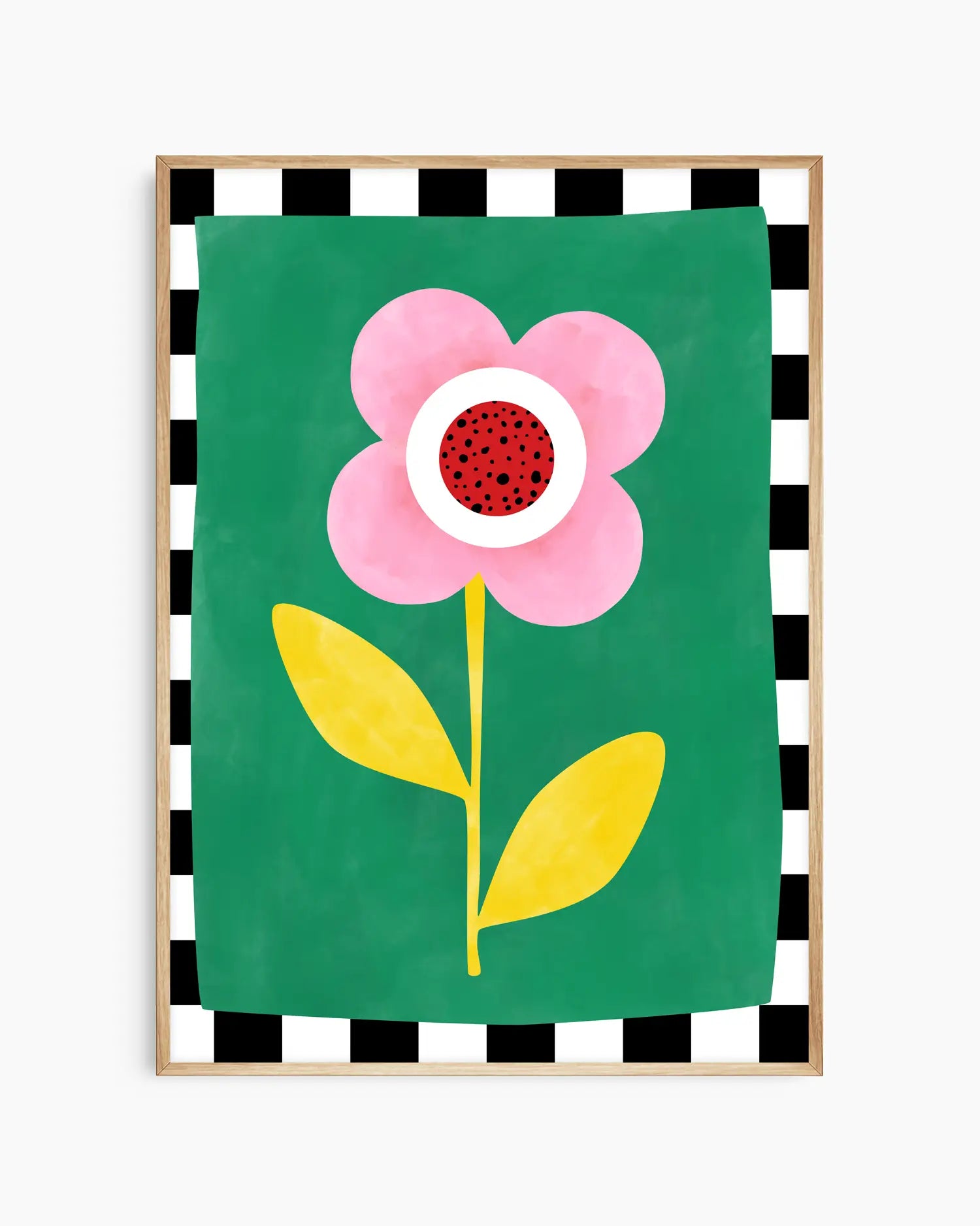 Barnrumstavla med stiliserad rosa blomma och gula blad på grön bakgrund med rutmönstrad kant, inramad i ekram. En mjuk och charmig väggdetalj.