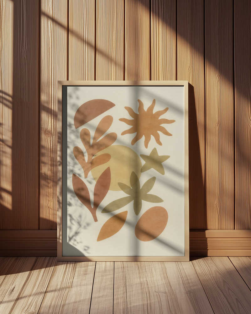 Inramad barntavla med abstrakta former i jordnära toner placerad på golvet framför en vägg med träpanel.