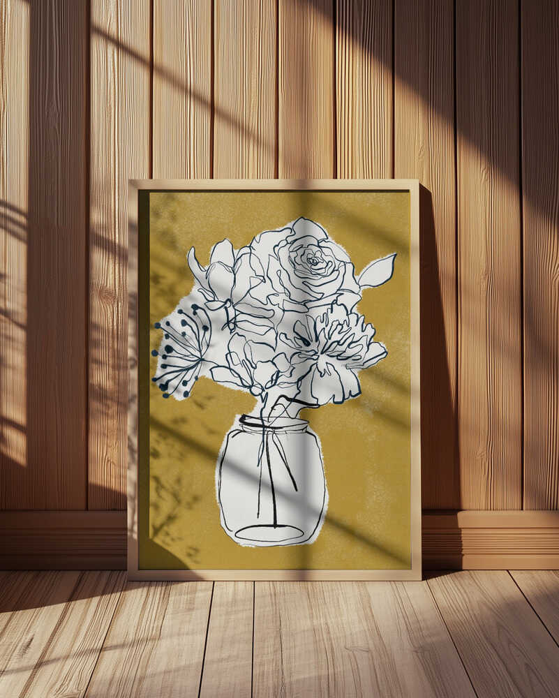 Inramad barntavla med tecknade blommor i vas mot ockragul bakgrund placerad på golvet framför en vägg med träpanel.