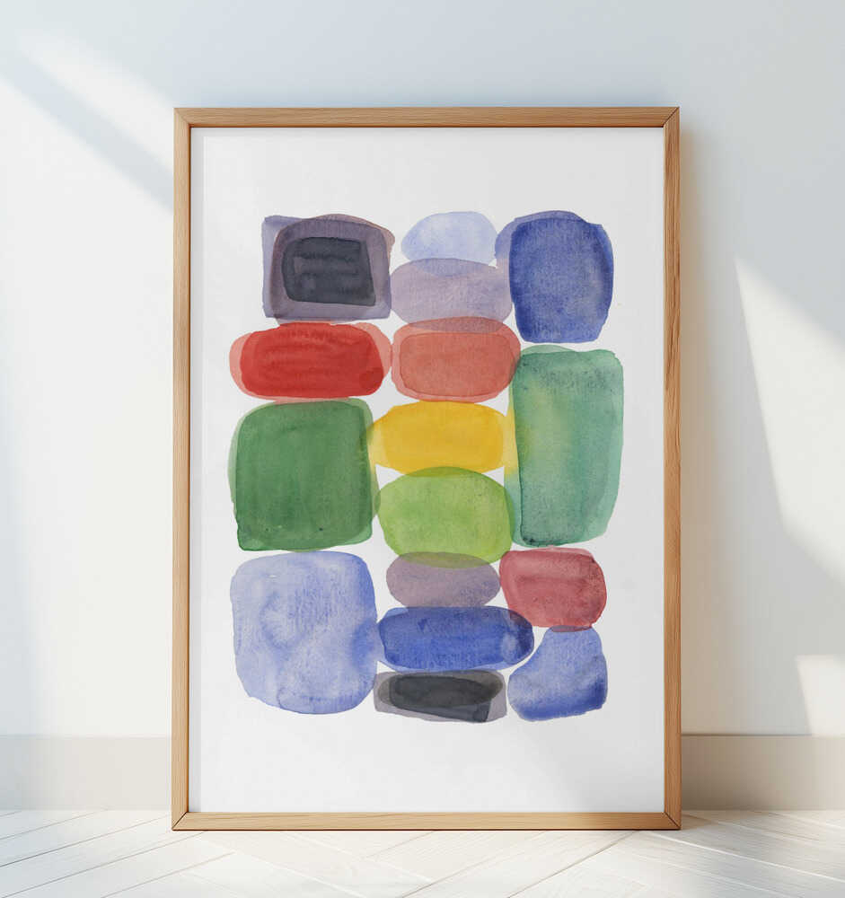 Inramad barntavla med färgblock i akvarellstil lutad mot en vit vägg på golvet. En minimalistisk och modern barnrumstavla med konstnärligt uttryck.