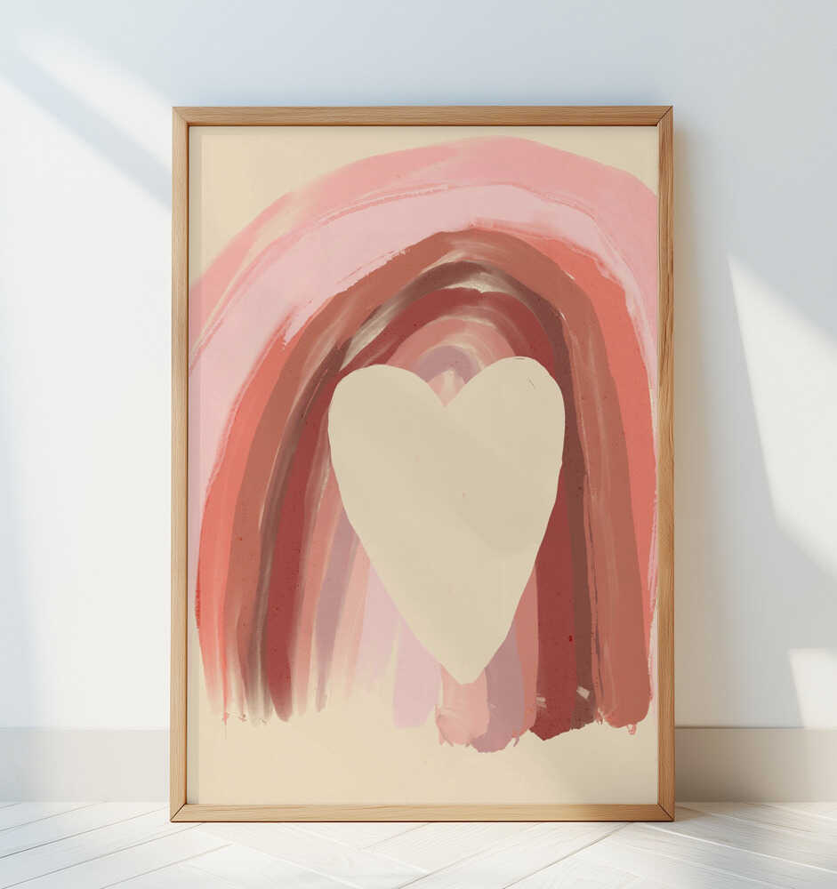Inramad tavla med mjuka rosafärgade penseldrag och hjärtmotiv lutad mot en vit vägg där färgerna får stråla.