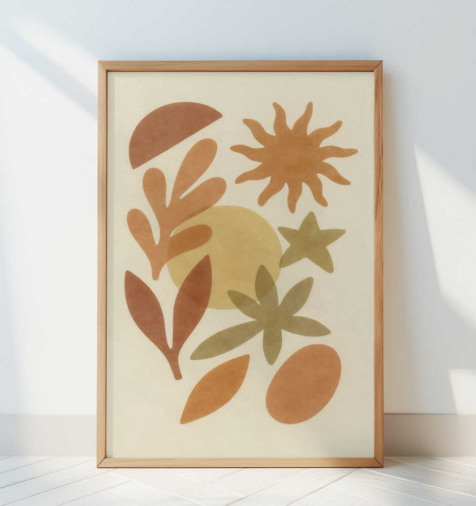 Inramad barntavla med abstrakta former i jordnära toner lutad mot en vit vägg.
